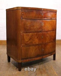 Antique continental flame mahogany bow front chest of drawers