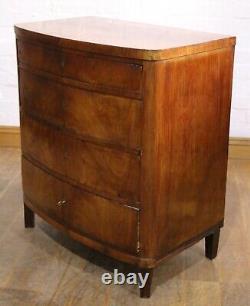 Antique continental flame mahogany bow front chest of drawers