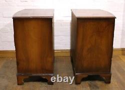 Antique style pair of bow front chest of drawers