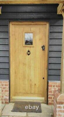 External Suffolk front door with rectangular unglazed window Solid OAK