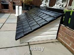 Fibreglass front door porch canopy with gallows and roof with black tiles