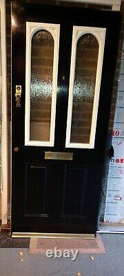 Front DoorAND frame black 83inx36in used all locks firniture and fittings