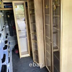 Multiple Units Of IKEA bookshelves with glass door fronts 5 6 In Total