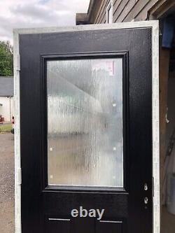 New 1003-2095 Black Composite Door In A Upvc Frame Opens Outwards