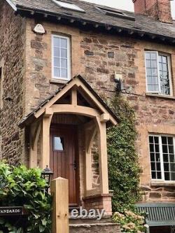 THE BRABOURNE PORCH in solid oak. CURVED FRONT POSTS & FULL CURVED TIE BEAM