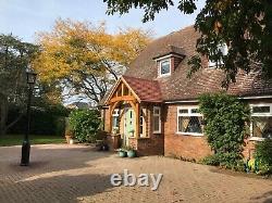 The Brabourne Oak Porch. Feature Curved Front Posts & Full Curved Tie Beam