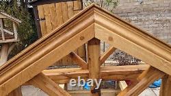 Wooden front door canopy porch